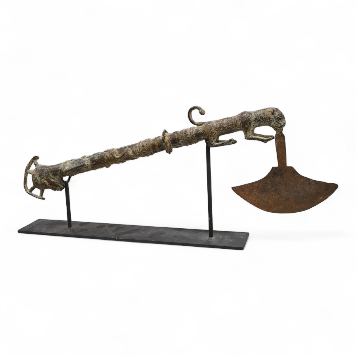 A Benin-type bronze zoomorphic ceremonial axe, on stand, 62cm long